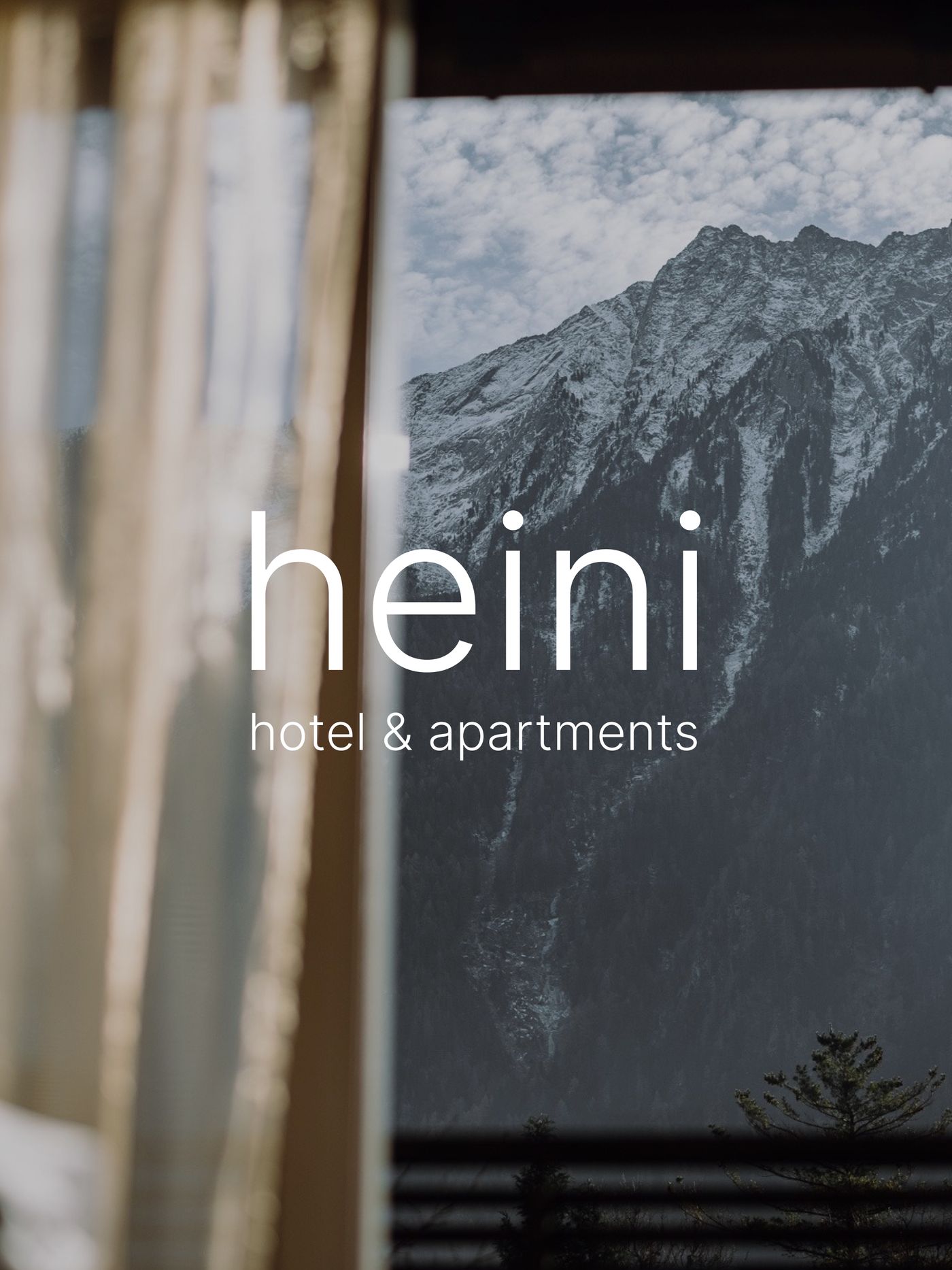 Heini Hotel & Apartments – Branding Logo